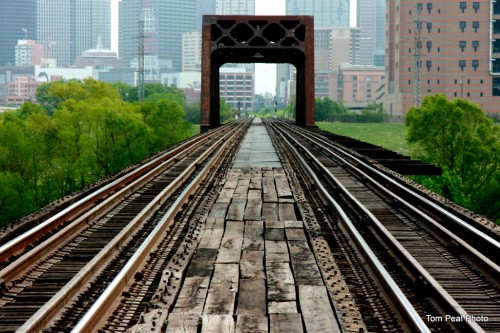 Railway bridge resembling gunsight aross the Trinity River pointing at Dallas TX 4-7-11
