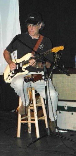 Tom Gruning, guitarist extraordinaire, songwriter, Doctor of Musical Arts.  Ph.D. in ethnomusicology