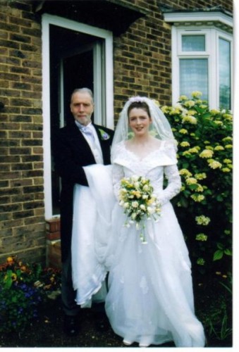 My daughter Danielle's wedding day &amp; mio, giving on her arm.