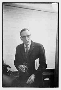 The photo is of William Burroughs, but the poem is not about him or his life, but the photo inspired the poem.