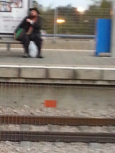 bearded man across the tracks