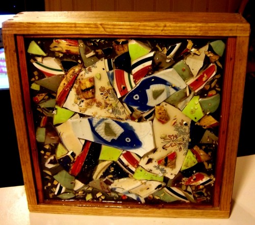 broken pottery set in poured urethane in oak box